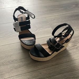 Michael Antonio wedge sandals.